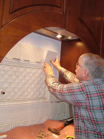 This highly-decorative kitchen tile backsplash was installed in one day.