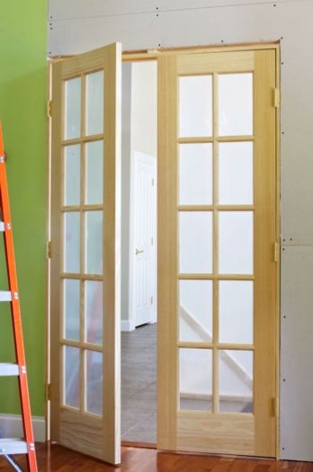These interior french doors just need trim, paint and hardware to be complete. PHOTO CREDIT:  Brent Walter