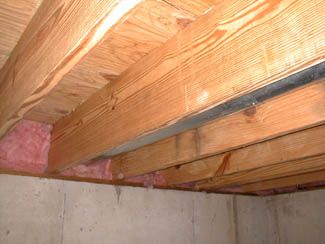 These are 2x12 floor joists under my own laundry room.  They span approximately 16 feet and there is simply no bounce in that floor.
