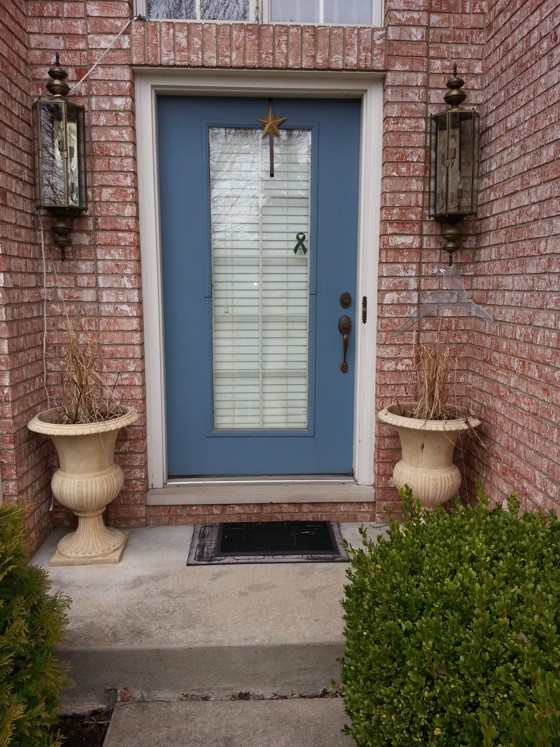 A standard-sized door can be used to replace this existing door. Photo Credit: Karen Grater