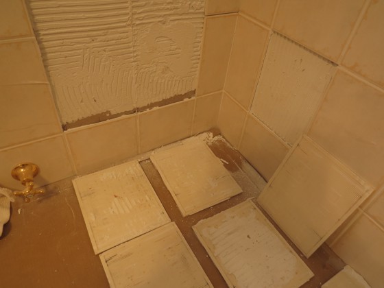 These wall tiles had poor adhesion to the wall. The reasons for failure are many. Photo Credit: Lloyd May