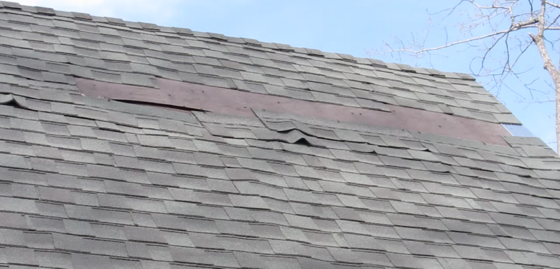 You might think you need a new roof when you see damage like this, but it’s possible you can repair the roof in less than an hour. Photo Credit: Tim Carter