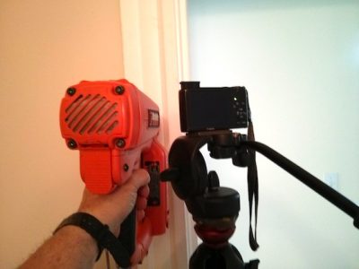 Here's how I took the above photos. The camera was locked in position in all directions and could not move the only thing that could move was the nail gun. Photo credit: Tim Carter