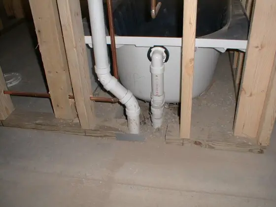 bath tub pipes exposed wall