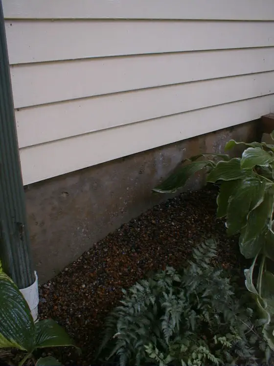 termites side of house gravel barrier