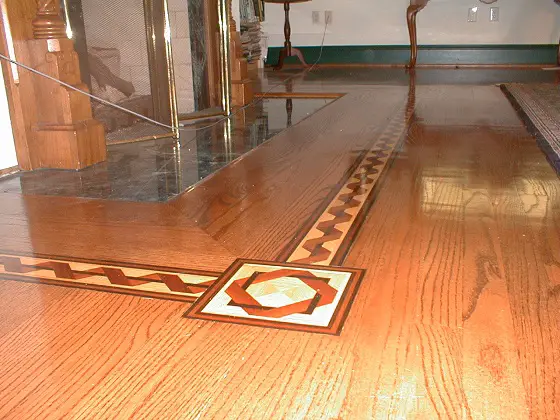 hardwood floor with inlay fireplace