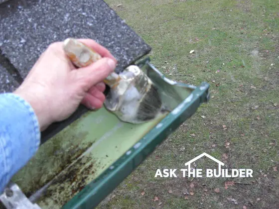 Paint Brush Cleaning Gutter