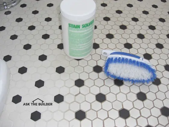 stain solver scrub brush partially cleaned