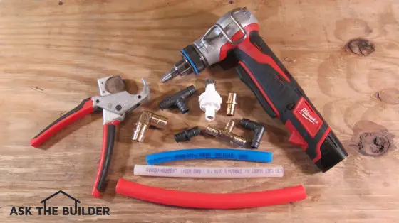 Here are different pieces of pex pipe, fittings and a cool cordless expanding tool that allows you to make connections in seconds. Photo credit: Tim Carter