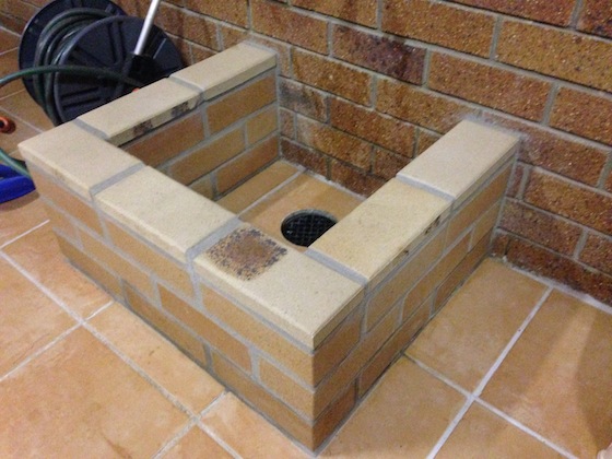 Look at Satoshi's expert workmanship on this small brick pond. WOW! Many pros couldn't do this level of work!  Photo credit: Satoshi Segawa