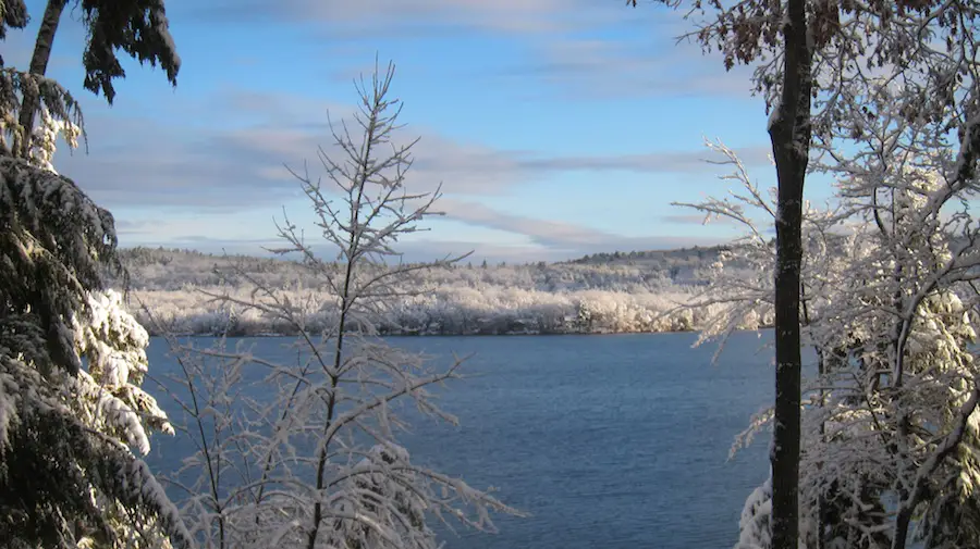 I was standing on my lower deck looking east northeast across Loch Winnisquam. It was the most gorgeous snowfall I think I've ever witnessed. Photo credit: Tim Carter