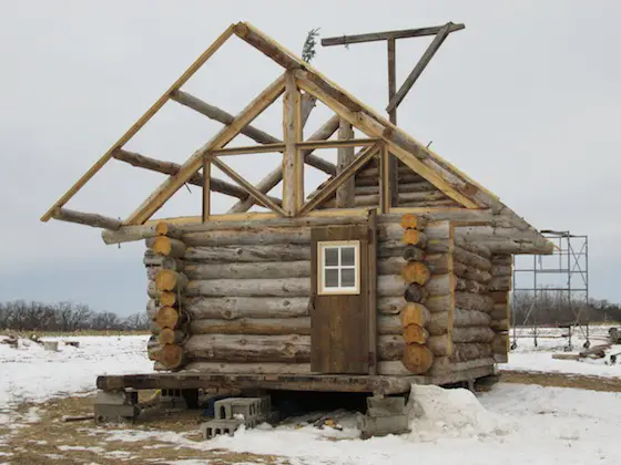 log cabin that Dick Anderson is working on.