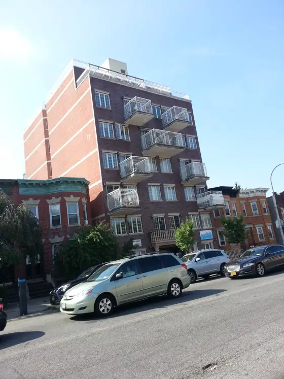 This new mid-rise condo building experiences leaks through the brick walls during rainstorms. The cause is poor workmanship. Photo Credit: Stanley Pikovsky