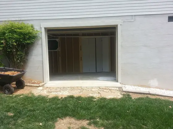This is an open garage door the owner want to switch out for a french door. It’s not that hard to do. Photo Credit: Glenn Kanak