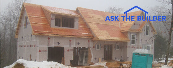 rain soaked framing lumber house under construction