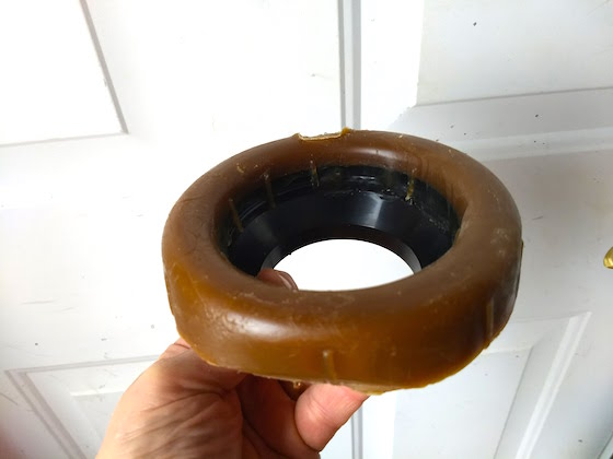 sewer gas smell wax toilet leak gasket under underside detached