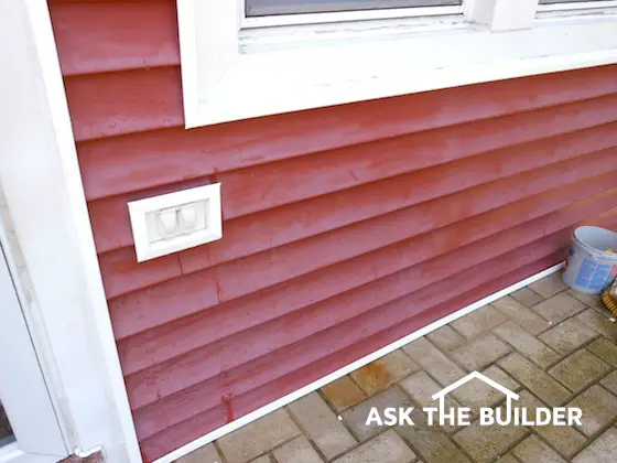 Faded red vinyl siding