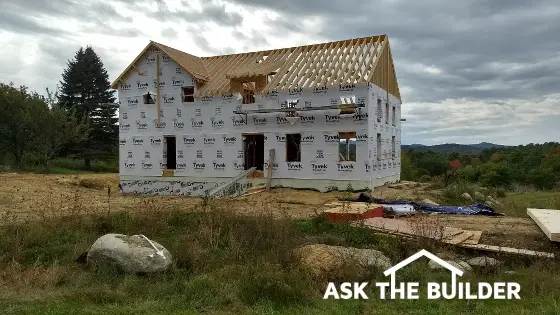 new home under construction in a rural area