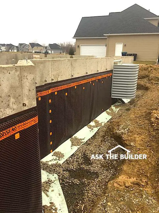 Delta MS drain tile being installed