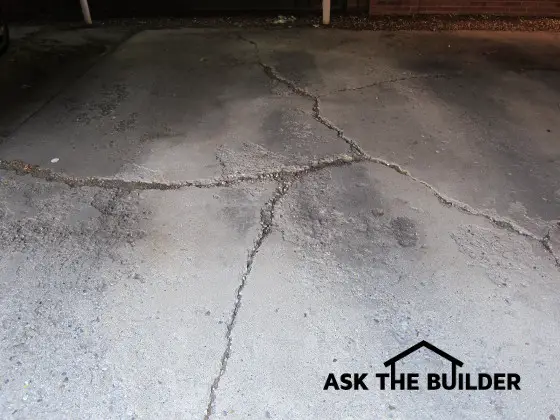 Cracked Concrete Carport & Rubbing Door