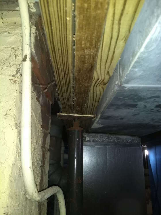 replace wood beam basement