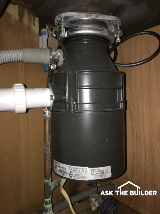 garbage disposal freezes up