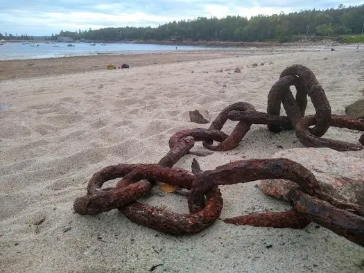 rusty chain on beach