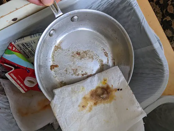 greasy pan with paper towel