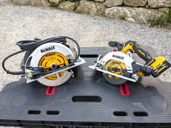corded and cordless circular saws on table