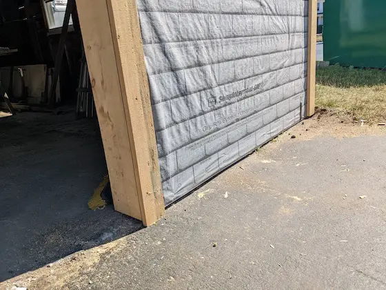 wood trim garage door vinyl siding