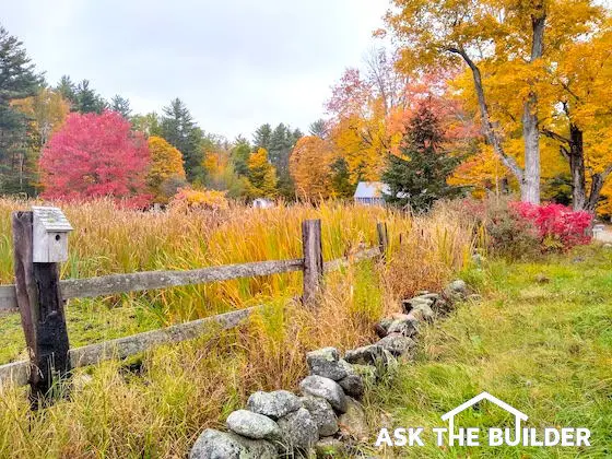 wood fence autumn fall color bird house