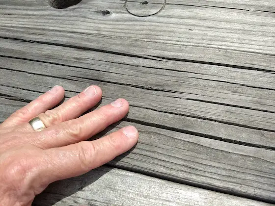 why does wood crack cracked deck lumber