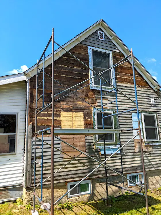 pipe scaffolding next to old house