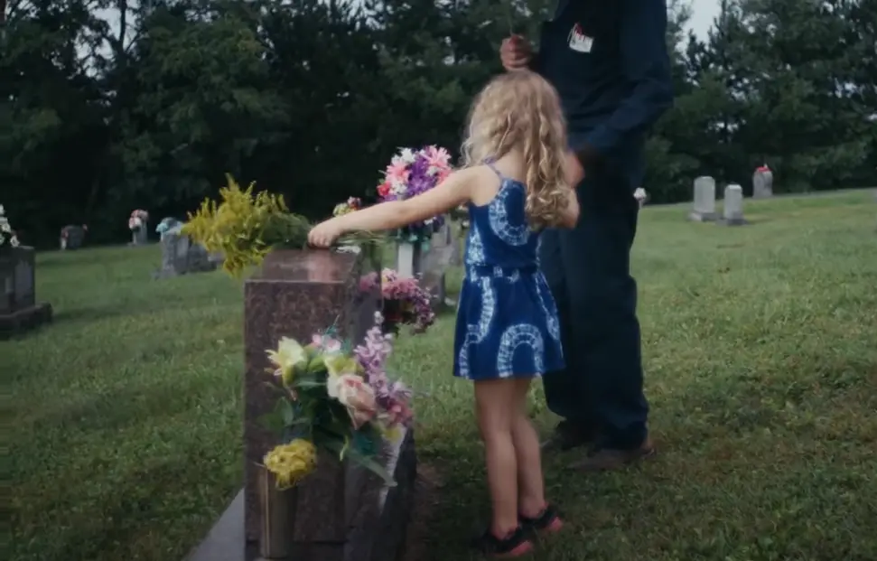 small girl in cemetery