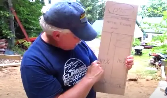 tim carter holding cardboard illustration