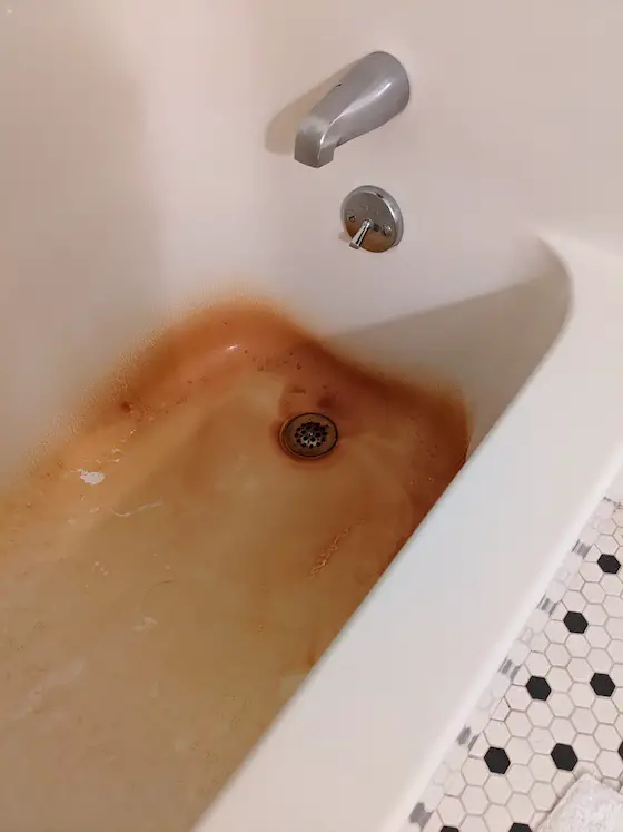 rust in acrylic tub shower