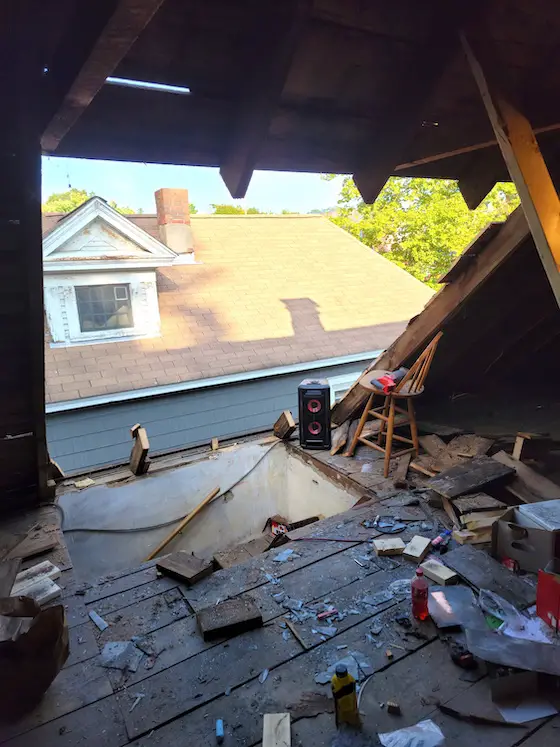 huge hole cut into a roof