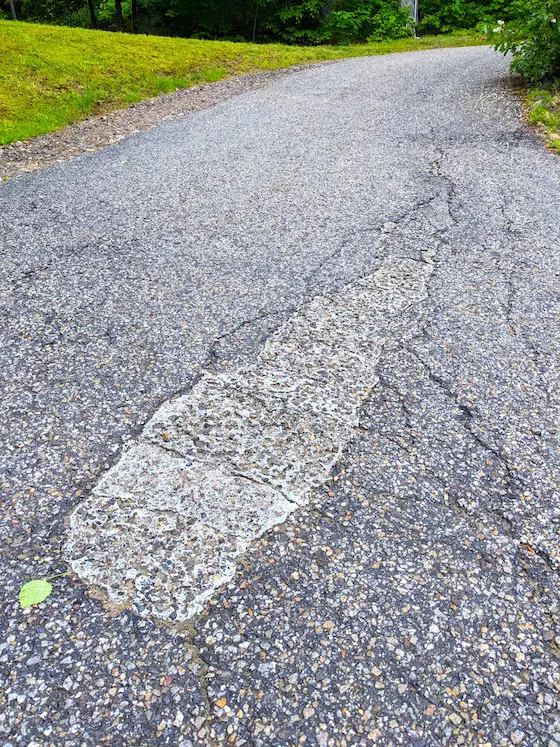 epoxy patch in a blacktop driveway