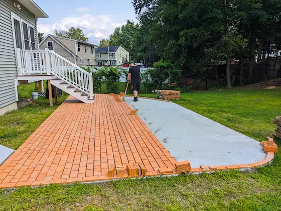 clay paving brick patio on top of a concrete slab