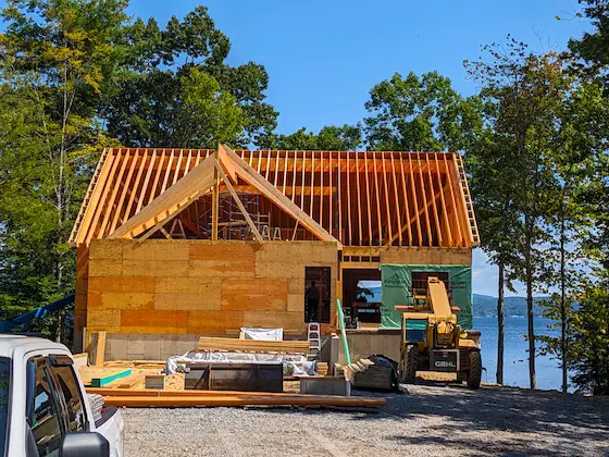 new house being built roof framing rough carpentry