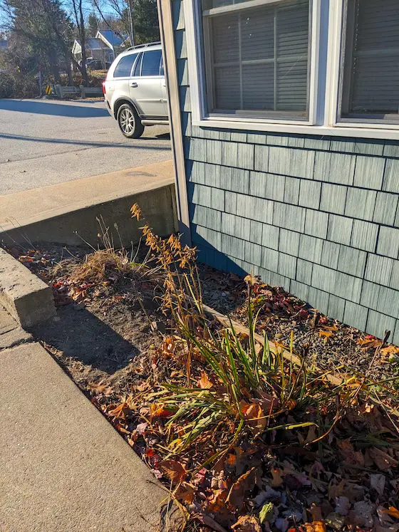 building set too low in ground retaining wall and parking lot