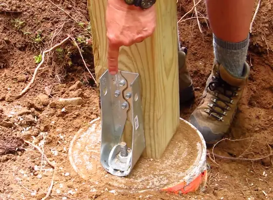 hold-down anchor bolting wood post to concrete pier