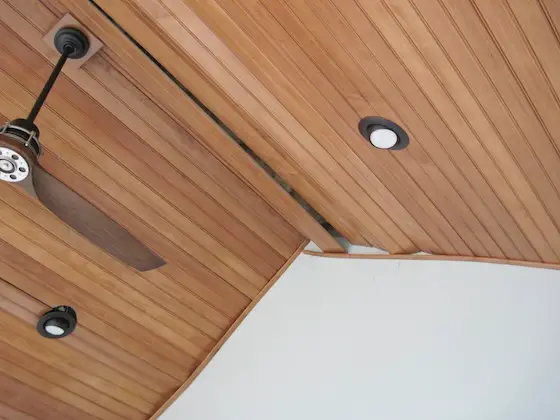 buckled beadboard wood ceiling