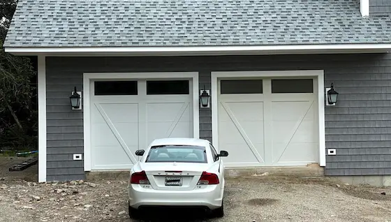 two car garage with custom doors