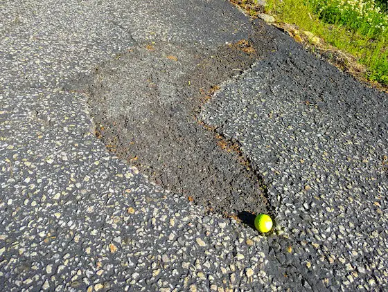 blacktop asphalt driveway crumbling repair