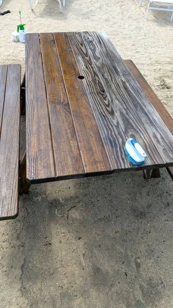 picnic table being cleaned
